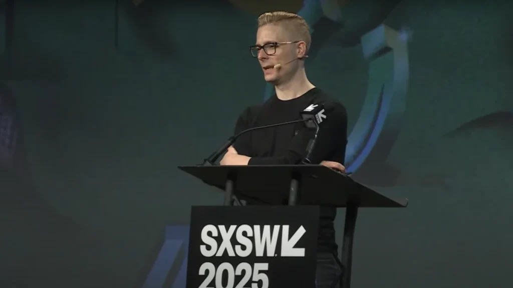 Ian Beacraft speaking on stage at SXSW 2025 delivering a keynote on AI and the future of work
