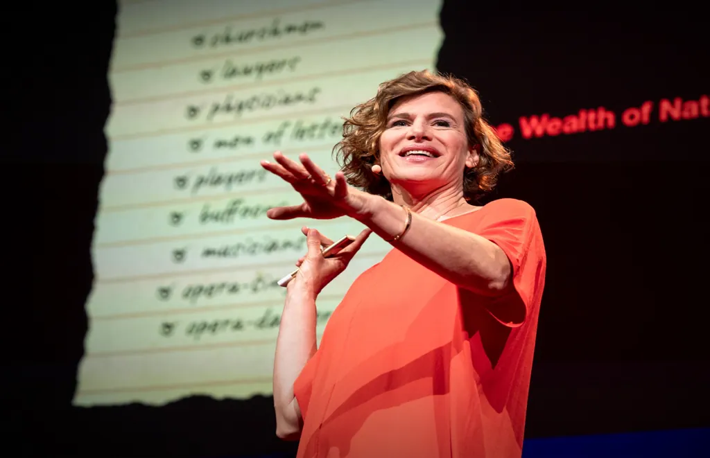 Mariana Mazzucato speaking on innovation economics, public value, and mission-driven investment strategy during a conference presentation.