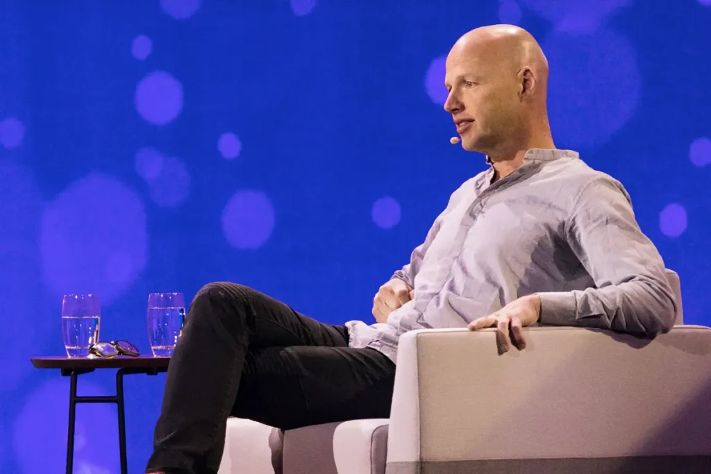 Sebastian Thrun speaking onstage about artificial intelligence, online learning, and workforce innovation