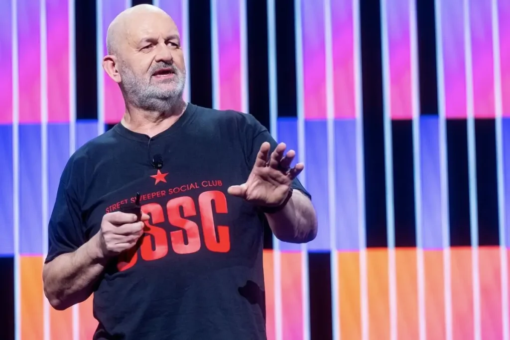 Werner Vogels, Amazon CTO, delivering a keynote on cloud architecture and resilience | Aurum Speakers Bureau
